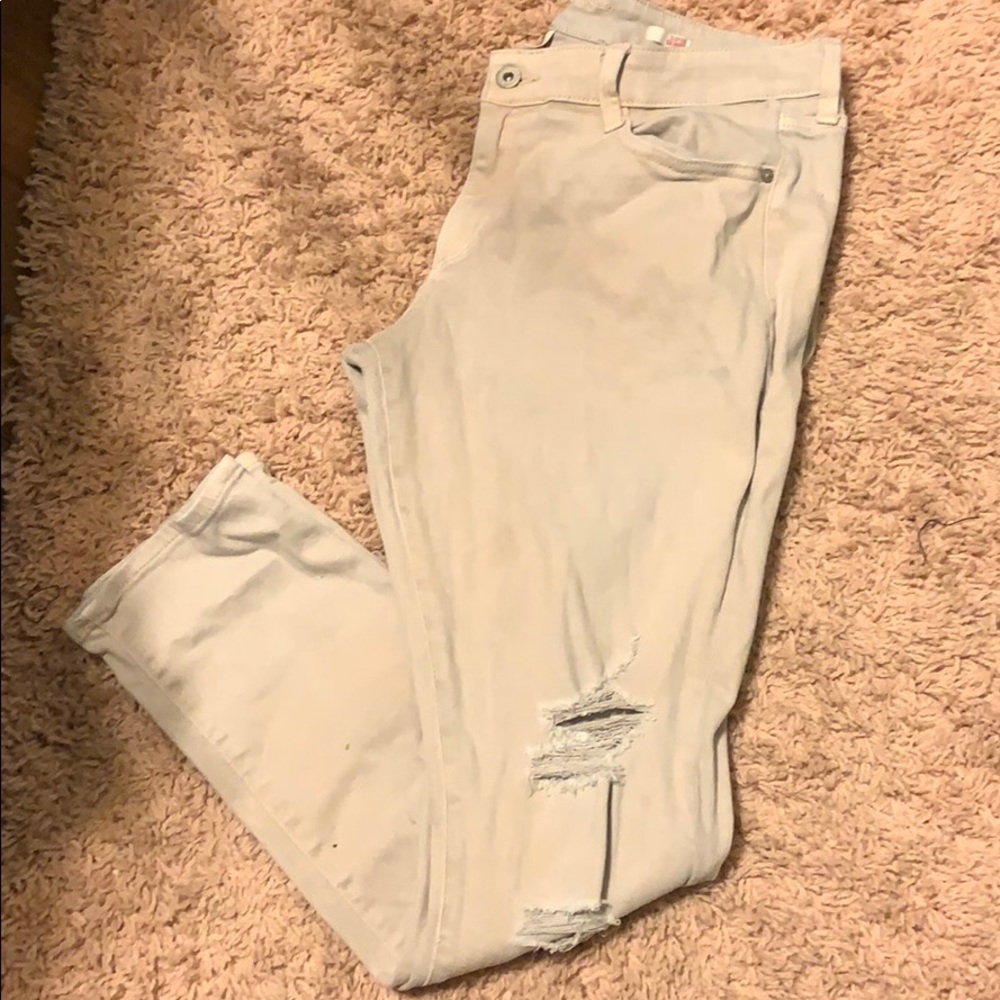 Faded pink jeans with a little destress